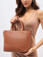 Shell hand-held bag Tan