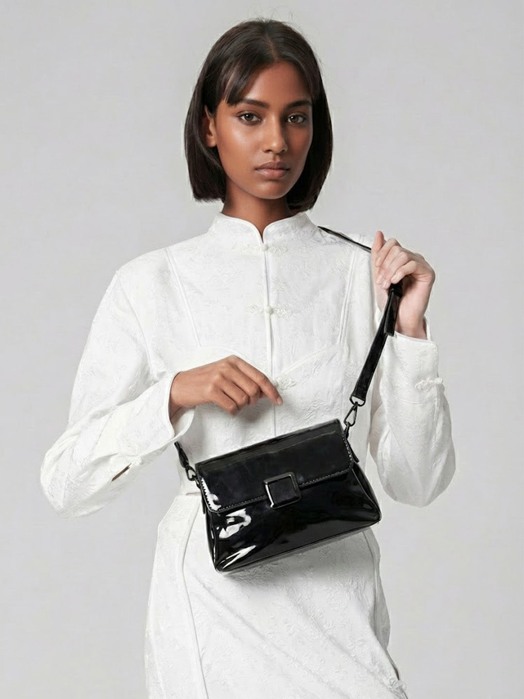 Radiant Black Patent Crossbody Bag